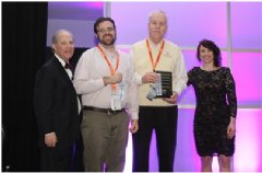 Paul Brady and Garry Godden accept the Best of 50+ Attached Home up to 1,800 Square Feet award for the Porto Residence - Verona