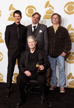 Beach Boys win first-ever Grammy Award.
Clockwise : ‘The Smile Sessions’ producers Dennis Wolfe, Alan Boyd, Mark Linett, and Brian Wilson