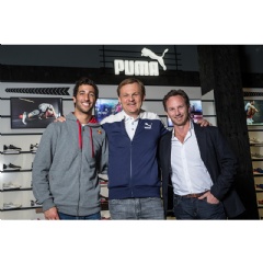 Björn Gulden, Chief Executive Officer for PUMA, Christian Horner, Team Principle of the INFINITI RED BULL RACING team, and Daniel Ricciardo, driver of the INFINITI RED BULL RACING team