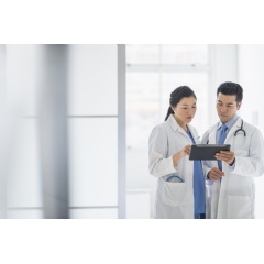 Clinicians view patient data on tablet
