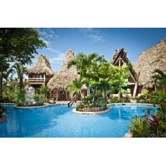 The thatched roof cabanas of beautiful Ramon�s Village on Ambergris Caye.