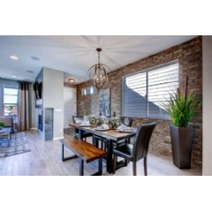 The Bluebird plan is featured as the model home at Park Hill Village and shows a spin on urban living with its “industrial chic” interior design.