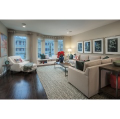 Refreshing neutrals create a beautiful backdrop for deep teal and rich coral accents in this WB Homes’ model home, merchandised by Lita Dirks & Co.