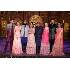 Family (L to R) Mr Akash Ambani, Mrs Shloka Ambani, Mr Anant Ambani, Mrs Radhika Ambani, Mr Mukesh Ambani, Mrs Nita Ambani, Mr Anand Piramal, Mrs Isha Ambani.