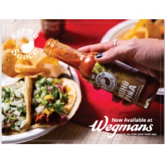 Promotional material announcing Karma Sauce’s availability at Wegmans.