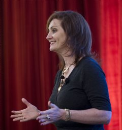 Michele Molitor, executive coach giving a talk on women’s leadership.
