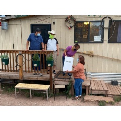 Left to Right: Lee R. Belone (recipient), Orenthal Belone (Lee’s son), Katie Belone (Lee’s wife) and Roselinda Benally (Lee’s caregiver).