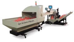 New Ergocon Towel Inspection and Packaging System packages up to 7000 clean towels per hour.