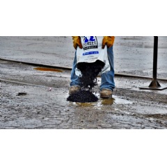 EZ Street Asphalt works quickly, it works in water, and is guaranteed permanent.