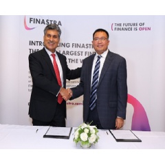 (Left) Anoop Sonpar, Regional Director at Finastra seals the deal with (Right) Mr Win Lwin, Managing Director at KBZ Bank. -Credit: Finastra-