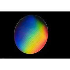 Intel Corporation has invented a spin qubit fabrication flow on its 300 mm process technology using isotopically pure wafers like this one. (Credit: Walden Kirsch/Intel Corporation)