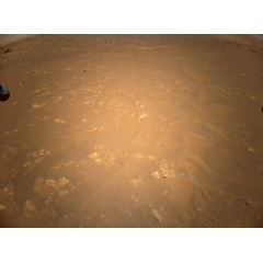 In this illustration, NASA�s Ingenuity Mars Helicopter flies above the surface of the Red Planet with the agency�s Perseverance rover close by. Credits: NASA/JPL-Caltech