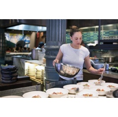 #ShakeHunger Challenge Winner, Chef Leah Cohen, plating her Corn Som Tam with Thai Grilled Chicken