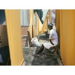 Woman between tents, Resurrection City, Washington, D.C., 1968