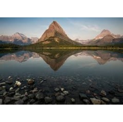 Glacier National Park in Montana was established in 1910 and contains 25 active glaciers that move due to thawing and melting. It is one of the nation’s 419 national park sites. (Photo credit: NPS Photo/Tim Rains)