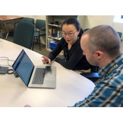 Caption: Kit Siu, a Principal Engineer on GE Researchs Controls and Optimization team, confers with her colleague Dan Prince, a Senior Systems Engineer at GE Aviation Systems (complete caption below)