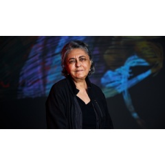 Image: Nalini Malani in front of her work �My Reality is Diff=erent�, 2022; Animation chamber, 9-channel installation, sound: 25.15 mins � Nalini Malani; Photo: Luke Walker
