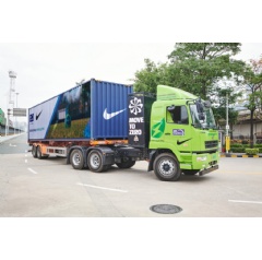 Electric heavy-duty prime mover transporting goods as part of Nike�s sustainable first-mile transportation initiative in Southern China.