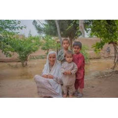 UNICEF/UNI577384/Khayyam
On 16 May 2024, Bigom, an 80-year-old grandmother, was with her three grandsons when flash floods hit her village in Baghlan province, Afghanistan. (see complete caption below)