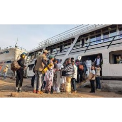 People wait to board a ship at the port of Bukavu, the capital of South Kivu province. | DR Congo 2025  Amani Alimasi/MSF