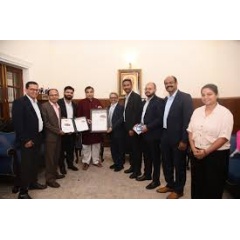 The All-new Altroz is now Indias Safest Hatchback. In the image, the Honble Union Minister for Road Transport and Highways, Shri Nitin Gadkari, is seen handing over the Bharat-NCAP Certificate to senior officials from Tata Motors