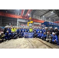 The Primetals Technologies team celebrates the first coil at Zhongshou Special Steel’s Arvedi ESP line.