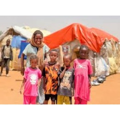 UNICEF/UN0876231 On 24 June, in Sudan, women and children displaced by the fighting in Al Obeid seek refuge in Tagat gathering...
