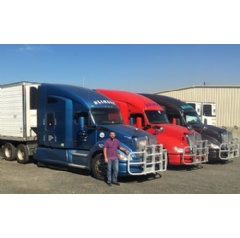 Matt Blinsky, vice president of Floyd Blinsky Trucking, is shown with three of the company’s Kenworth T680s with 76-inch sleepers, the Driver’s Studio, and PACCAR MX-13 engines.