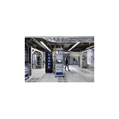 IBM Q computation center - Inside the first IBM Q computation center, dilution refrigerators with microwave electronics (middle) that operate IBM Q Network clients� cloud access to 20 qubit processor. (Credit: Connie Zhou)
