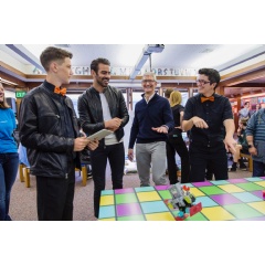 Tim Cook and Nyle DiMarco react to a robot dance sequence created by a student using Swift Playgrounds.