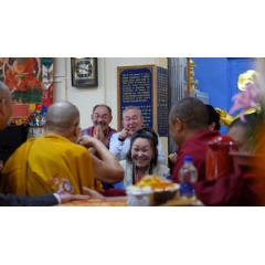 His Holiness the Dalai Lama greeting members of the audience as he arrives at the Main Tibetan Temple for the final day of his teachings requested by Russian Buddhists in Dharamsala, HP, India. Photo by Tenzin Choejor