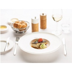 Main course in First Class: sauted black cod fillet with seafood nage