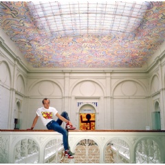 Keith Haring photographed on the evening before the opening of his solo at the Stedelijk Museum. Photo: Archief Stedelijk Museum Amsterdam, Keith Haring artwork  Keith Haring Foundation