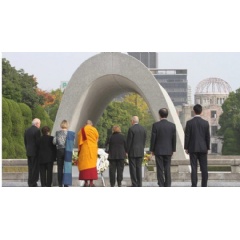 His Holiness the Dalai Lama and fellow Nobel Laureates paying their respects at Hiroshima Memorial Park in Hiroshima, Japan. Photo by Taikan Usui