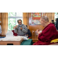 Climate mitigation innovator Sonam Wangchuk describing the block of ice taken from a glacier on the Kardungla pass in Ladakh to highlight the urgency of climate change to His Holiness the Dalai Lama in Dharamsala, HP, India. Photo by Tenizn Choejor