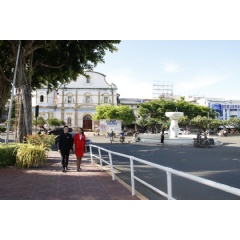 AirAsia Cabin Crew poses in front of the Immaculate Conception Metropolitan Cathedral
