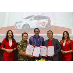 The MoU signing between airasia ride and PERHEBAT.