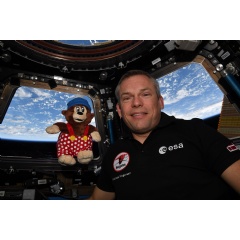 A bear turning 72
 ESA/NASA
ESA astronaut Andreas Mogensen poses in the Cupola of the International Space Station together with Rasmus Klump, a Danish cartoon figure known for being inquisitive and exploring the world.