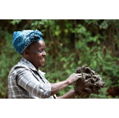 Charity Njeri Gachanja, a stoves producer in Kenya Murang�a County preparing the clay for the ceramic liner production, � GIZ