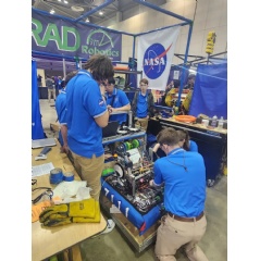 Students from RAD Robotics Team 7111 – a FIRST Robotics team from Huntsville, Alabama, and sponsored by NASA’s Marshall Space Flight Center – make adjustments to their robot during the 2024 Rocket City Regional FIRST Robotics Competition in Huntsvill
