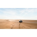 Guided by tradition, driven by electricity: crossing Morecambe Bay in a Porsche Macan
