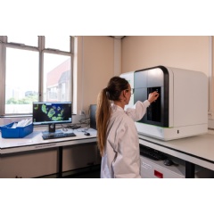 Person working in a lab. Credit: Midlands Mindforge.