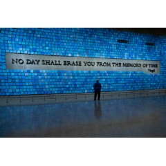 Bill Spade stands in front of the memorial wall at the 9/11 Memorial & Museum. (National Geographic/Virginia Sherwood