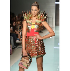 McDonald’s makes a splash with McDCouture at Miami Swim Week. Designed by Miami international University of Art and Design Fashion student Lucila Martinez, this Roman military inspired look is sizzling with style.