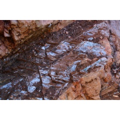 Researchers at Argonne looked at the dynamics of the transport of certain elements  especially rubidium  at the interface between water and mica, a flat transparent mineral pictured above. (Image by Beth Harvey/Shutterstock)