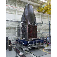Boeing-built TDRS-M working its way through Boeing’s El Segundo satellite factory as it readies for launch. (Boeing photo)