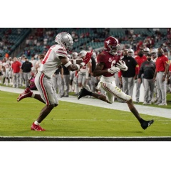 Alabama wide receiver DeVonta Smith scores a touchdown past Ohio State safety Josh Proctor during the first half of the College Football Playoff national championship game, Jan. 11, 2021, in Miami Gardens, Fla. (AP Photo/Chris OMeara)