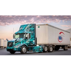 Volvo Trucks and NFI are teaming up to participate in Run on Less – Electric, an electric truck technology demonstration that showcases advancements in freight efficiency. (See complete caption bellow)