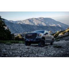 2023 GMC Sierra 1500 AT4X AEV Edition off-road
The 2023 GMC Sierra 1500 AT4X AEV Edition driving on a rocky hillside. The AT4X AEV Edition delivers extreme off-road capability without compromising on-road comfort.