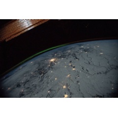 A portion of the International Space Station’s solar arrays caps this nighttime view of Earth with aurora as the orbital complex orbited 258 miles above Ukraine and Russia.
Credits: NASA